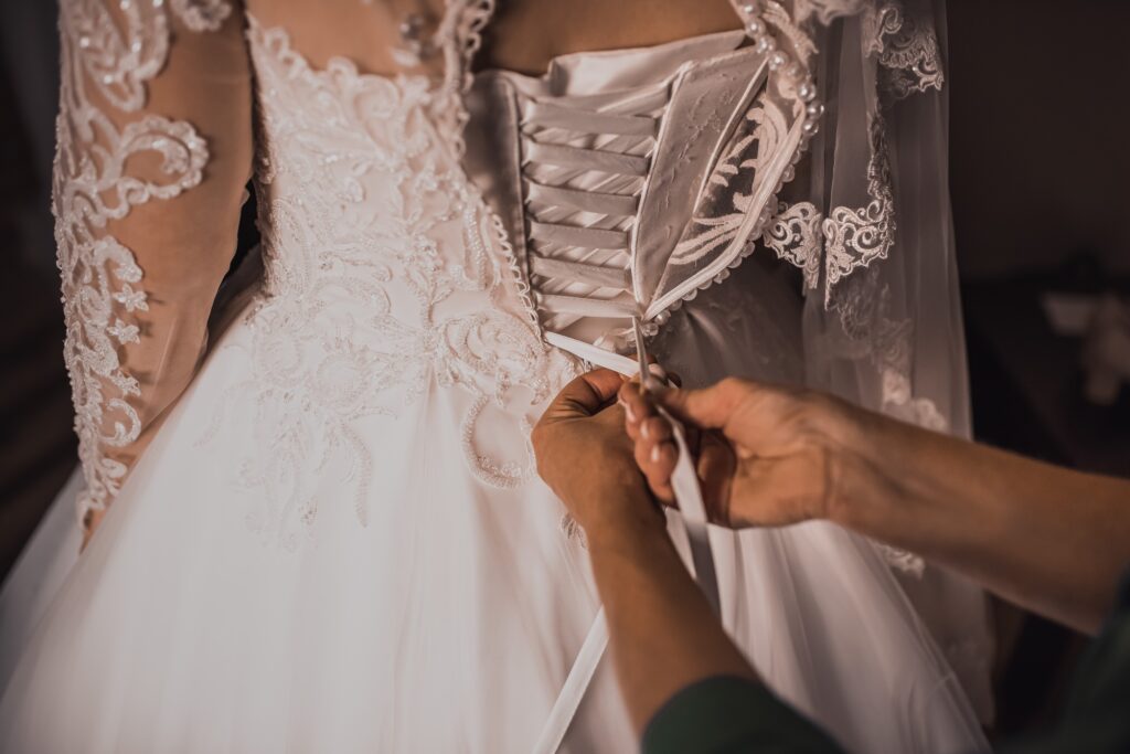 The back of the bride in a wedding dress